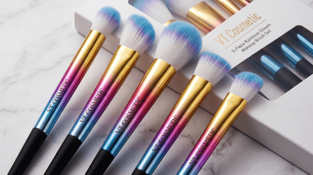 Wholesale Makeup Brush Set featuring a 5-piece Rainbow Dream collection by VT Cosmetic with vibrant gradient handles and blue-tipped bristles